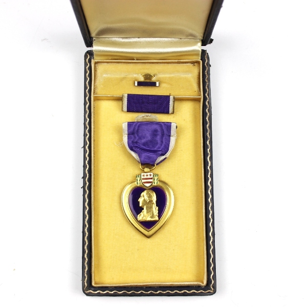Purple Heart medal with coffin-style box, lapel pin and ribbon