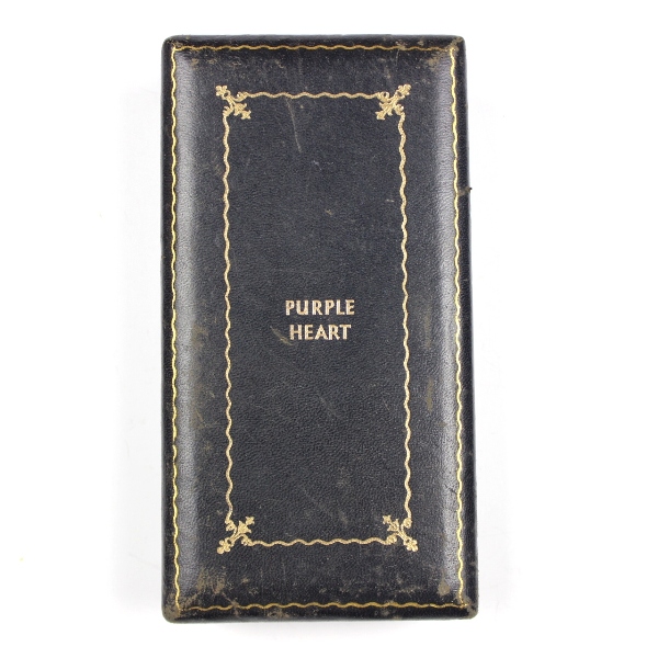 Purple Heart medal with coffin-style box, lapel pin and ribbon