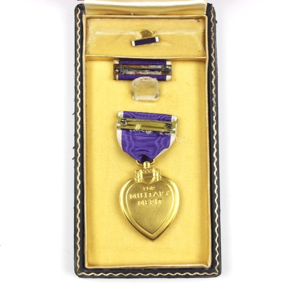 Purple Heart medal with coffin-style box, lapel pin and ribbon