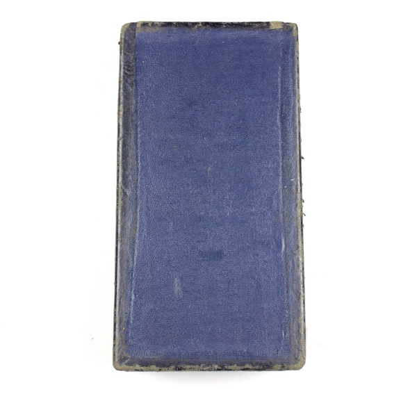 Purple Heart medal with coffin-style box, lapel pin and ribbon