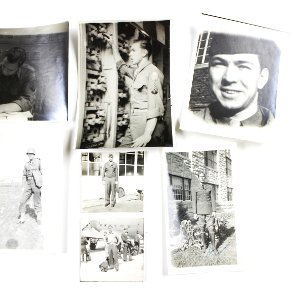 Interesting grouping of insignia, dog tags, ID documents, photos,…
